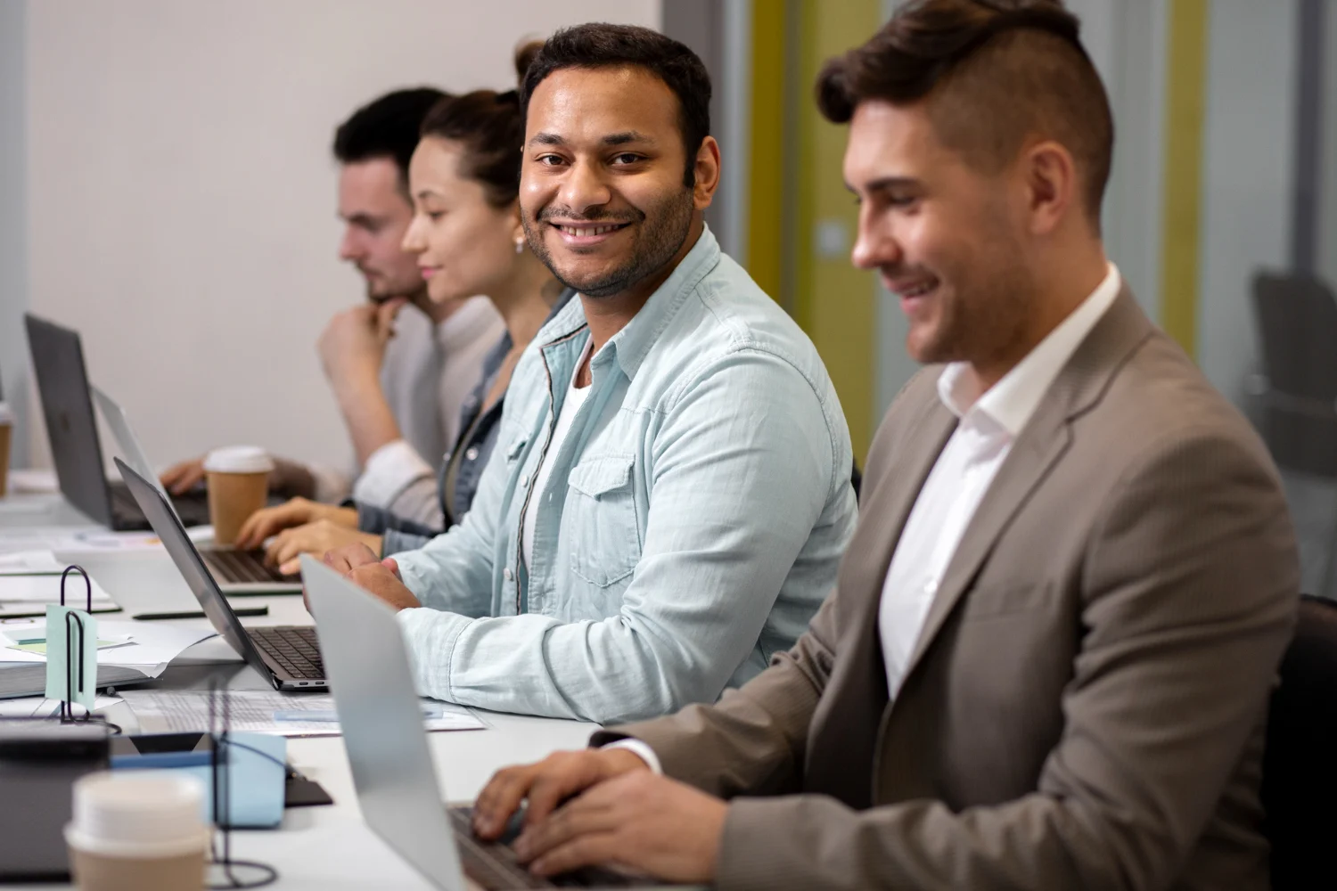 Colleagues collaborating around a meeting table